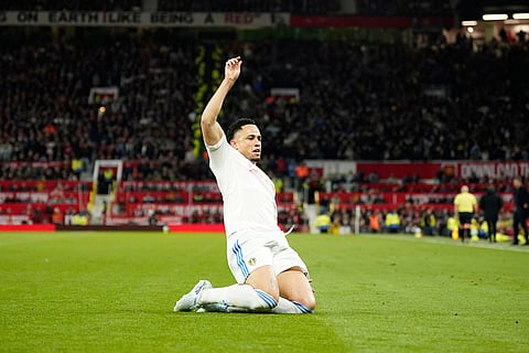 Leeds' Noah Okafor celebrates after scoring during the Premiier League soccer match between Manchester United and Leeds in Manchester, England.