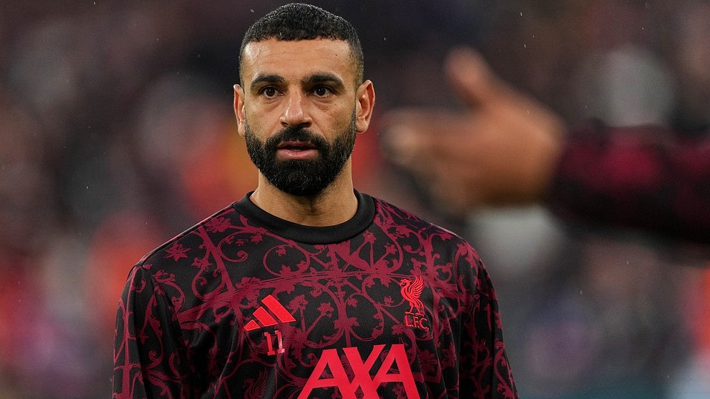 Mohamed Salah pauses during the warm-up before the Champions League quarter-final second leg match between Liverpool and Paris Saint-Germain in Liverpool.