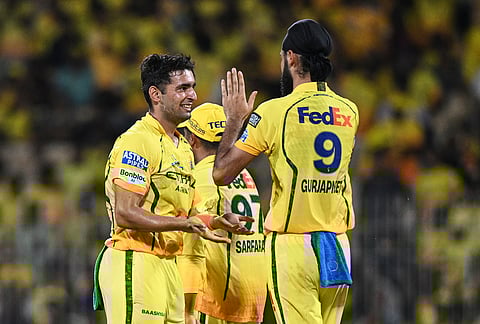 Chennai Super Kings' Anshul Kamboj celebrates with teammates the wicket of Kolkata Knight Riders' Ramandeep Singh during the Indian Premier League cricket match between Chennai Super Kings and Kolkata Knight Riders in Chennai.