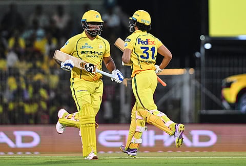 Chennai Super Kings' captain Ruturaj Gaikwad, right and Sanju Samson run between the wickets during the Indian Premier League cricket match between Chennai Super Kings and Kolkata Knight Riders in Chennai.