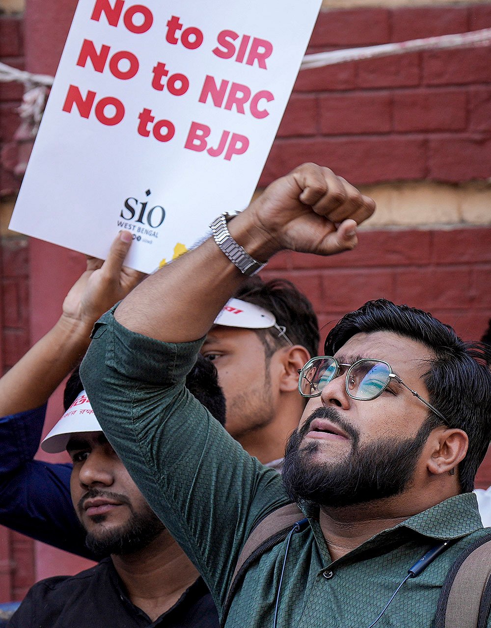Members of Votadhikar Raksha Mancha stage a protest demanding voting rights for deleted voters ahead of the West Bengal Assembly elections, in Kolkata.