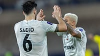 | Photo: X/Shabab_AlAhliFC : Shabab Al-Ahli's Saeid Ezatolahi celebrates with his teammate after scoring during the AFC Champions League Elite round of 16 match against Tractor FC on April 14, 2026.