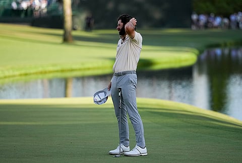 Cameron Young reacts after missing a putt on the 16th hole during the final round of the Masters golf tournament at the Augusta National Golf Club, in Augusta, Georgia.