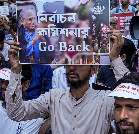 Members of Votadhikar Raksha Mancha stage a protest demanding voting rights for deleted voters ahead of the West Bengal Assembly elections, in Kolkata.