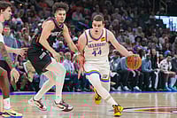 Phoenix Suns Vs Oklahoma City Thunder, NBA 2026: Phoenix Dismantles Thunder To Send Playoff Warning Shot - In Pics | Photo: AP/Kyle Phillips : Oklahoma City Thunder guard Nikola Topic, right, drives past Phoenix Suns guard Koby Brea during the second half of an NBA basketball game in Oklahoma City.