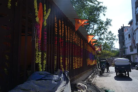 Saffron flags lining the roof of the recently constructed Hanuman Temple in Tri Nagar.