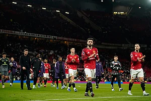| Photo: AP/Dave Thompson : Manchester United players walk off the pitch after the Premiier League soccer match between Manchester United and Leeds in Manchester, England.