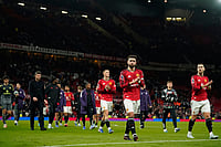 Manchester United Vs Leeds United, EPL 2025-26: Leeds Stun Ten Man Red Devils to Boost Survival Hopes - In Pics | Photo: AP/Dave Thompson : Manchester United players walk off the pitch after the Premiier League soccer match between Manchester United and Leeds in Manchester, England.