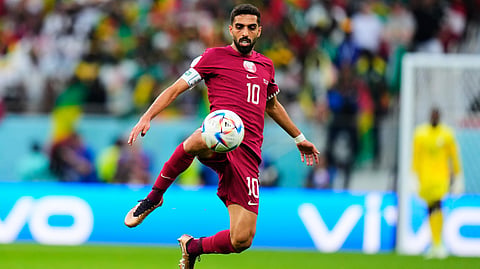 Qatar's Hassan Al-Haydos controls the ball during a World Cup group A soccer match against Senegal at the Al Thumama Stadium in Doha, Qatar, Friday, Nov. 25, 2022. 