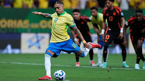 Brazil's Raphinha scores his side's opening goal against Colombia from the penalty spot during a FIFA World Cup 2026 qualifying soccer match at Mane Garrincha stadium in Brasilia, Brazil, Thursday, March 20, 2025. 