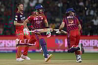 | Photo: AP/Aijaz Rahi : Lucknow Super Giants' Mitchell Marsh, right, and Aiden Markram run between the wickets to score during the Indian Premier League cricket match between Royal Challengers Bengaluru and Lucknow Super Giants in Bengaluru, India.