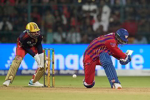 Lucknow Super Giants' Mukul Choudhary hits a boundary during the Indian Premier League cricket match between Royal Challengers Bengaluru and Lucknow Super Giants in Bengaluru, India.