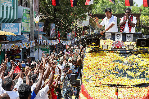 In this image received on April 15, 2026, Tamil Nadu Deputy Chief Minister and DMK Youth Wing Secretary Udhayanidhi Stalin, second right, greets the gathering during an election campaign in support of party candidate for Ottapidaram constituency, PM Ramajeyam, right, ahead of the state assembly elections, in Thoothukudi district.