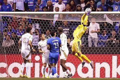 Hugo Lloris goalkeeper of the United States' Los Angeles FC, right, catches the ball during a CONCACAF Champions Cup quarterfinal second leg soccer match against Mexico's Cruz Azul in Puebla, Mexico.