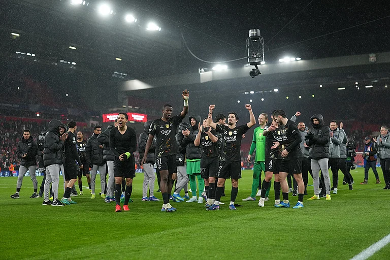 PSG players celebrate after the Champions League quarterfinal second leg soccer match between Liverpool and Paris Saint-Germain in Liverpool, England. - | Photo: AP/Jon Super