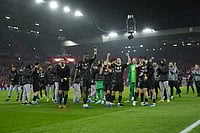 Liverpool 0-2 PSG, UEFA Champions League QF Leg 2: Ousmane Dembele's Double Blow Knocks Out The Reds | Photo: AP/Jon Super : PSG players celebrate after the Champions League quarterfinal second leg soccer match between Liverpool and Paris Saint-Germain in Liverpool, England.