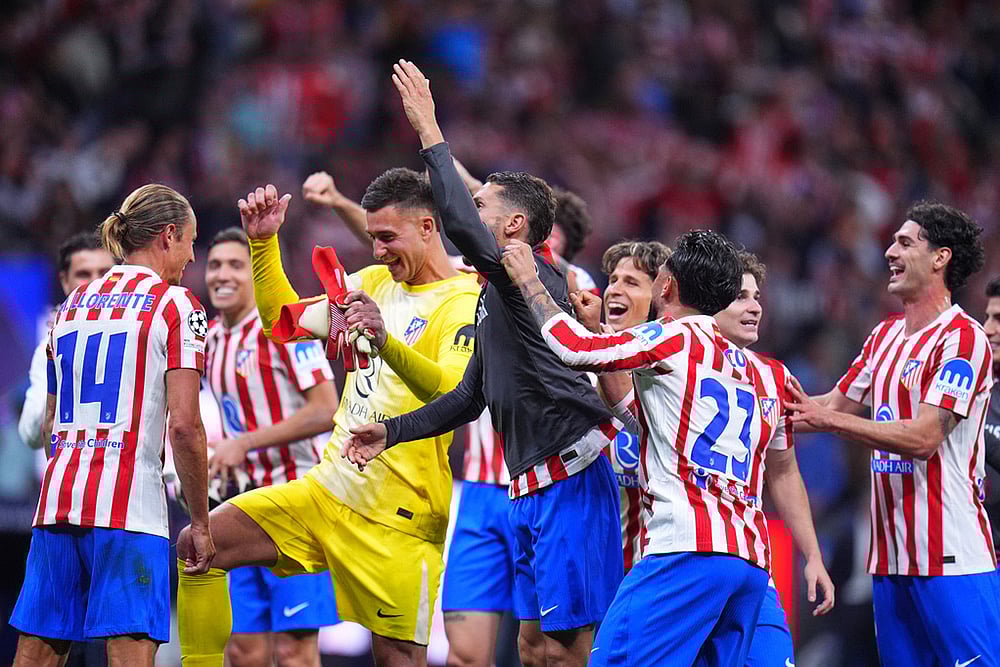 Atletico Madrid's players celebrate at the end of the Champions League quarterfinal second leg soccer match between Atletico Madrid and Barcelona in Madrid, Spain. - | Photo: AP/Manu Fernandez