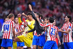 | Photo: AP/Manu Fernandez : Atletico Madrid's players celebrate at the end of the Champions League quarterfinal second leg soccer match between Atletico Madrid and Barcelona in Madrid, Spain.