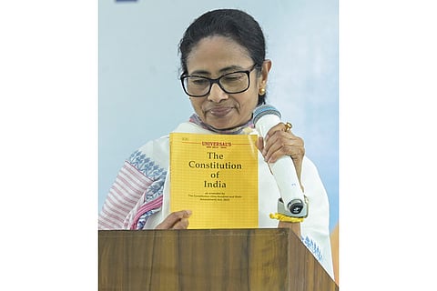 In this image received on April 14, 2026, West Bengal Chief Minister Mamata Banerjee during a public rally ahead of the state Assembly elections, in Tamluk, Purba Medinipur district.