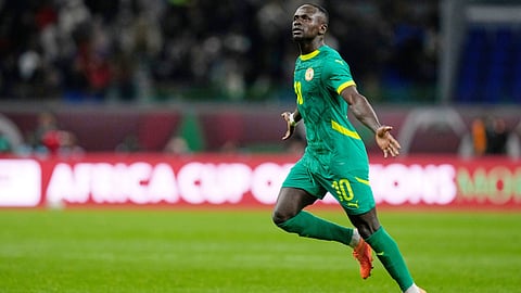 Senegal's Sadio Mane celebrates after scoring his side's opening goal during the Africa Cup of Nations semifinal soccer match between Senegal and Egypt, in Tangier, Morocco, Wednesday, Jan. 14, 2026.