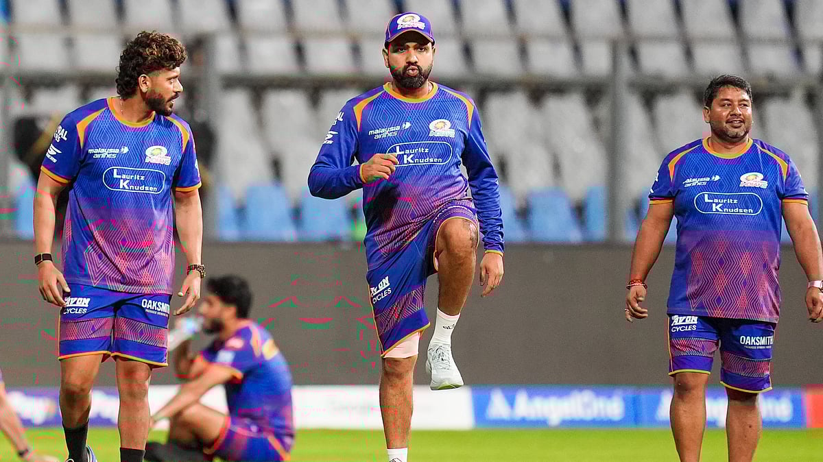 Mumbai Indians' Rohit Sharma, centre, during a practice session on the eve of the Indian Premier League 2026 match against Punjab Kings, at Wankhede Stadium. - PTI/Kunal Patil