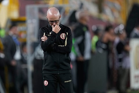 Coach Francisco Rabanal of Peru's Universitario gestures during a Copa Libertadores Group B soccer match against Chile's Coquimbo Unido in Lima, Peru.