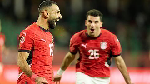 Egypt's Mohamed Salah celebrates after scoring his side's third goal during the Africa Cup of Nations round of 16 soccer match between Egypt and Benin in Agadir, Morocco, Monday, Jan. 5, 2026.