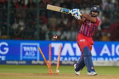 Lucknow Super Giants' Nicholas Pooran is bowled out by Royal Challengers Bengaluru's Josh Hazlewood during the Indian Premier League cricket match between Royal Challengers Bengaluru and Lucknow Super Giants in Bengaluru, India