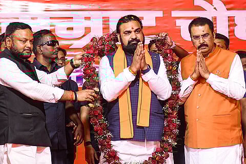 Newly-appointed Bihar Chief Minister Samrat Choudhary, centre, being garlanded by state BJP President Sanjay Saraogi, right, and others during a felicitation ceremony, at the party office, in Patna.