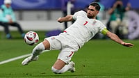 FIFA World Cup 2026 Group G Preview: Conflict-Ridden Iran Face Belgium, Egypt And New Zealand | Photo: AP/Thanassis Stavrakis : Iran's Alireza Jahanbakhsh passes the ball during the Asian Cup Group C soccer match between Hong Kong and Iran at Khalifa International Stadium in Doha, Qatar, Friday, Jan. 19, 2024.