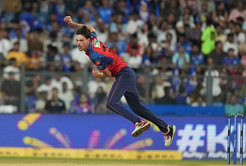Punjab Kings' Marco Jansen bowls a deliveryduring the Indian Premier League cricket match between Mumbai Indians and Punjab Kings in Mumbai.