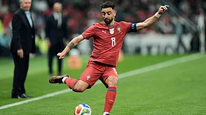 | Photo: AP/Fernando Llano : Portugal's Bruno Fernandes passes the ball during the international friendly soccer match between Mexico and Portugal in Mexico City, Saturday, March 28, 2026.