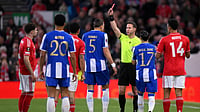 Gary Oakley/PA via AP : Jan Bednarek, center, is shown a red card and sent off by referee Danny Makkelie during the Europa League quarterfinal second leg soccer match.