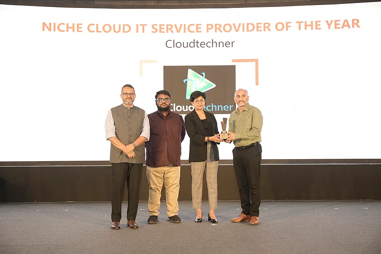 Siba Prasad Pulugurty receiving the Niche Cloud IT Service Provider of the Year at the Outlook Business Spotlight Leadership & Enterprise Awards - null