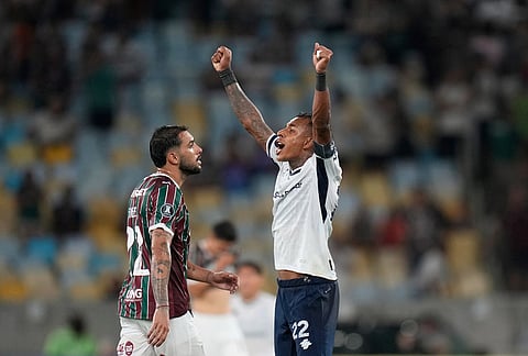 Sebastian Villa of Argentina's Independiente Rivadavia celebrates his team's 2-1 victory over Brazil's Fluminense at the end of a Copa Libertadores Group C soccer match in Rio de Janeiro.