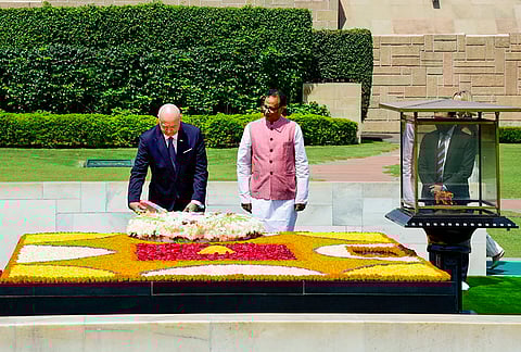 Austria Federal Chancellor Christian Stocker lays a wreath as he pays floral tribute to Mahatma Gandhi, at Rajghat, New Delhi. 
