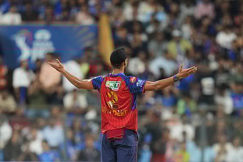Punjab Kings' Arshdeep Singh celebrate the wicket Mumbai Indians' Shefane Rutherford during the Indian Premier League cricket match between Mumbai Indians and Punjab Kings in Mumbai, India, Thursday, April 16, 2026.
