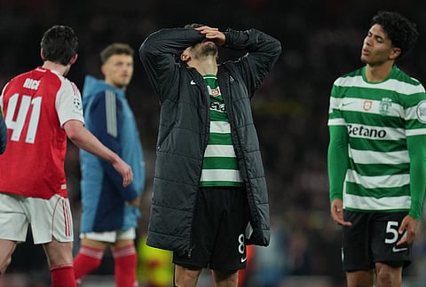Sporting's Pedro Goncalves reacts after the UEFA Champions League second leg quarterfinal soccer match between Arsenal and Sporting in London, England.