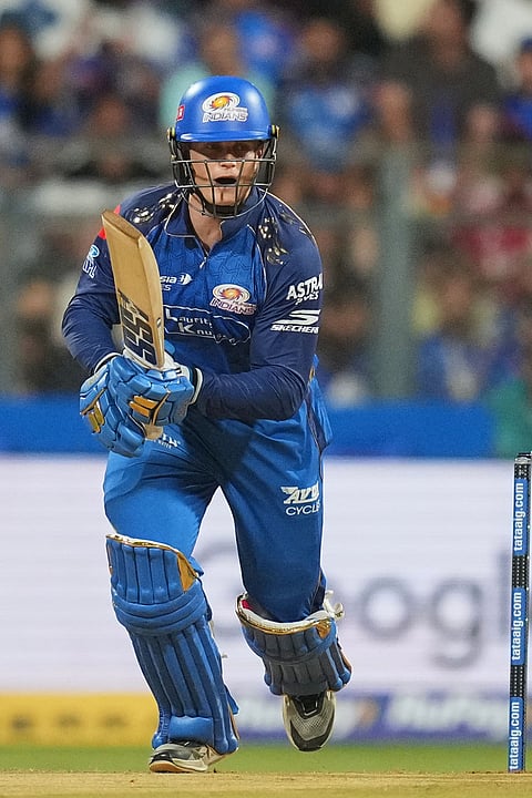 Mumbai Indians' Ryan Rickelton plays a shot during the Indian Premier League cricket match between Mumbai Indians and Punjab Kings in Mumbai.
