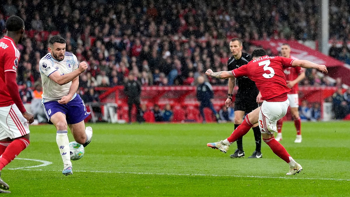 Nottingham Forest's Neco Williams scores their side's first goal of the game during the Premier League soccer match between Nottingham Forest and Aston Villa, in Nottingham, England, Sunday April 12, 2026. - | Photo: AP/Nick Potts