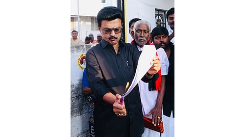 Tamil Nadu Chief Minister MK Stalin burns a copy of the proposed Delimitation bill during a protest, in Namakkal, Tamil Nadu, Thursday, April 16, 2026.
