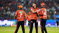 IPL 2026: Sunrisers Hyderabad’s David Payne Ruled Out With Ankle Injury Photo: AP/Aijaz Rahi : Sunrisers Hyderabad's David Payne, center, celebrates with teammates the wicket of Royal Challengers Bengaluru's captain Rajat Patidar during the Indian Premier League cricket match between Royal Challengers Bengaluru and Sunrisers Hyderabad in Bengaluru, India.