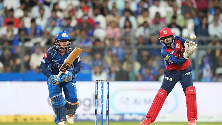Mumbai Indians' wicketkeeper Quinton de Kock plays a shot during the Indian Premier League cricket match between Mumbai Indians and Punjab Kings in Mumbai, India, Thursday, April 16, 2026. - AP Photo/Rafiq Maqbool