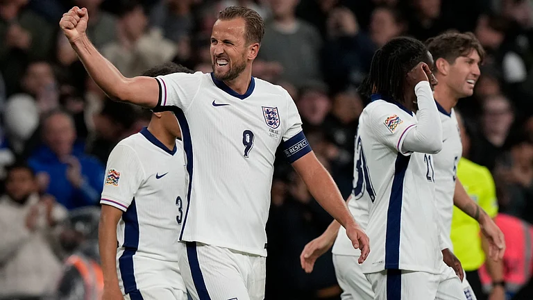 England's Harry Kane, left, celebrates after scoring his side's second goal during the Group F UEFA Nations League soccer match between England and Finland at Wembley Stadium in London, Tuesday, Sept. 10, 2024. - | Photo: AP/Frank Augstein