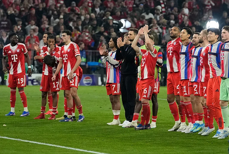 Bayern's players celebrate after winning the Champions League quarterfinal second leg soccer match between Bayern Munich and Real Madrid in Munich, Germany. - | Photo: AP/Matthias Schrader