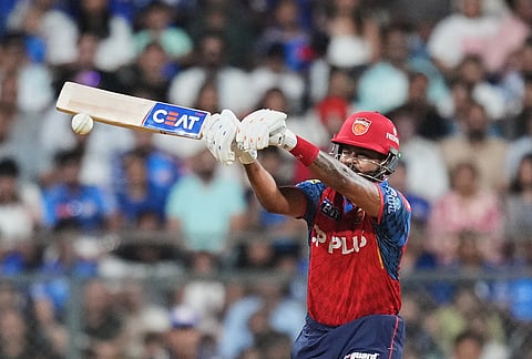 Punjab Kings' captain Shreyas Iyer plays a shot during the Indian Premier League cricket match between Mumbai Indians and Punjab Kings in Mumbai.