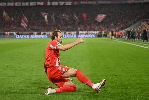 Bayern's Harry Kane celebrates after scoring his side's second goal during the Champions League quarterfinal second leg soccer match between Bayern Munich and Real Madrid in Munich, Germany.