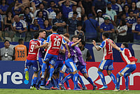 Cruzeiro 1-2 Universidad Catolica, Copa Libertadores: Heartbreak For 'The Greatest In Minas' At Mineirao | Photo: AP/Gilson Lobo : Players of Chile's Universidad Catolica celebrate their side's second goal against Brazil's Cruzeiro scored by teammate Jimmy Martinez during a Copa Libertadores Group D soccer match in Belo Horizonte, Brazil.