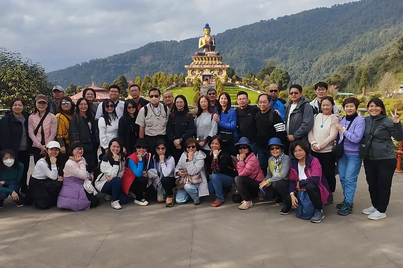 Group at Buddha Park of Ravangla with large Buddha statue