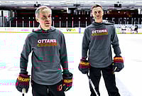 | Photo: Spencer Colby/The Canadian Press via AP : Canada Prime Minister Mark Carney, left, and President of Finland Alexander Stubb speak to reporters as they participate in an Ottawa Charge hockey practice session at TD Place in Ottawa. 